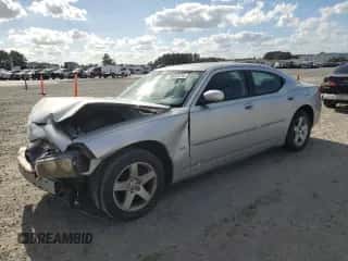 2010 Dodge Charger SXT с VIN 2B3CA3CV1AH268055, выставлен на аукционе Copart как лот 78662674 с пробегом 146 256 миль миль и Списание • Salvage title. История ставок и продаж доступна на DreamBid. Изображение 1.