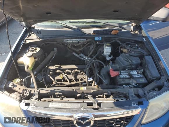 ✅ 2009 Mazda Tribute Touring • VIN: 4F2CZ02789KM03061 • Lot: 82269425. Listed on Copart with 116,336 mi. Free auction sales archive from the USA and detailed vehicle history report at DreamBid. Image 12.