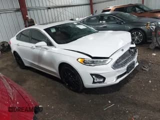 ✅ 2020 Ford Fusion Titanium • VIN: 3FA6P0D9XLR137939 • Lot: 43441079. Listed on IAAI with 80,627 mi. Free auction sales archive from the USA and detailed vehicle history report at DreamBid. Image 1.