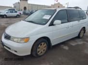✅ 2004 Honda Odyssey EX-L • VIN: 5FNRL18014B121667 • Lot: 43823364. Listed on IAAI with 181,640 mi. Free auction sales archive from the USA and detailed vehicle history report at DreamBid. Image 2.