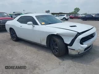 ✅ 2021 Dodge Challenger SXT • VIN: 2C3CDZGG2MH521669 • Lot: 42202396. Wystawiony na IAAI z przebiegiem 138 263 mil. Bezpłatny archiwum sprzedaży aukcyjnych z USA i szczegółowy raport historii pojazdu na DreamBid. Zdjęcie 1.