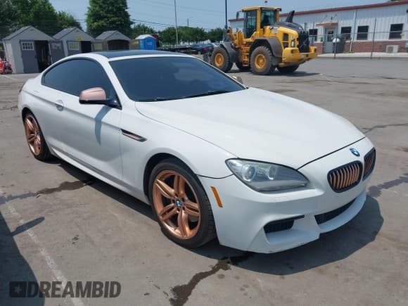 ✅ 2013 BMW 6 Series 650i xDrive • VIN: WBAYM1C56DDZ02569 • Lot: 42413753. Listed on IAAI with 117,691 mi. Free auction sales archive from the USA and detailed vehicle history report at DreamBid. Image 1.