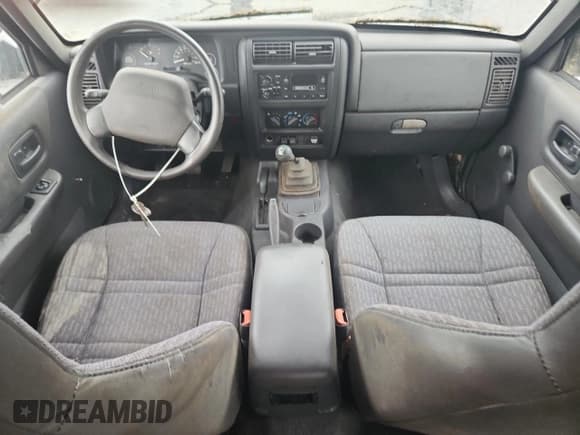 ✅ 1999 Jeep Cherokee • VIN: 1J4FF28P4XL560533 • Lot: 59180605. Listed on Copart with 190,262 mi. Free auction sales archive from the USA and detailed vehicle history report at DreamBid. Image 8.