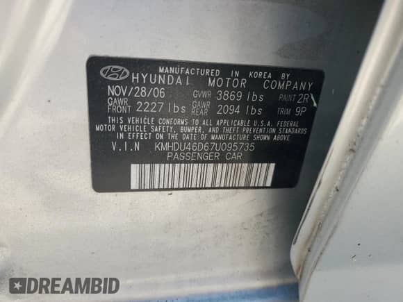 2007 Hyundai Elantra GLS z VIN KMHDU46D67U095735, wystawiony jako Copart lot #65307904 z przebiegiem 180 452 mil mil oraz Szkoda całkowita • Salvage title. Historia ofert i sprzedaży dostępna na DreamBid. Obrazek 12.