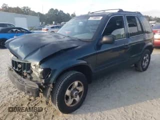 ✅ 2002 Kia Sportage • VIN: KNDJB723025123785 • Lot: 77158894. Listed on Copart with 146,621 mi. Free auction sales archive from the USA and detailed vehicle history report at DreamBid. Image 1.