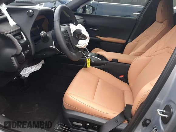 ✅ 2023 Lexus UX 250h Premium • VIN: JTHP6JBH6P2159687 • Lot: 82954783. Wystawiony na Copart z przebiegiem 2 669 mil. Bezpłatny archiwum sprzedaży aukcyjnych z USA i szczegółowy raport historii pojazdu na DreamBid. Zdjęcie 7.