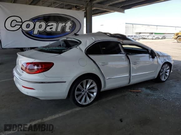 ✅ 2010 Volkswagen CC Luxury • VIN: WVWHP9AN7AE553665 • Лот: 61105085. Опубликован ранее на Copart с пробегом 143 192 миль. Бесплатный доступ к архиву аукционных продаж из США и подробный отчёт об истории автомобиля на DreamBid. Изображение 3.