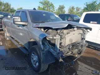 ✅ 2023 Ram 2500 Tradesman • VIN: 3C6UR5HJ1PG555439 • Lot: 42230594. Listed on IAAI with 56,459 mi. Free auction sales archive from the USA and detailed vehicle history report at DreamBid. Image 1.