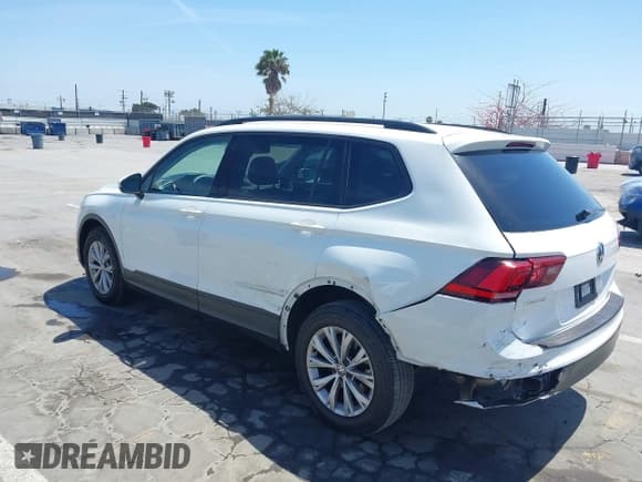 ✅ 2019 Volkswagen Tiguan S • VIN: 3VV1B7AX1KM101407 • Lot: 42032761. Listed on IAAI with 51,868 mi. Free auction sales archive from the USA and detailed vehicle history report at DreamBid. Image 3.