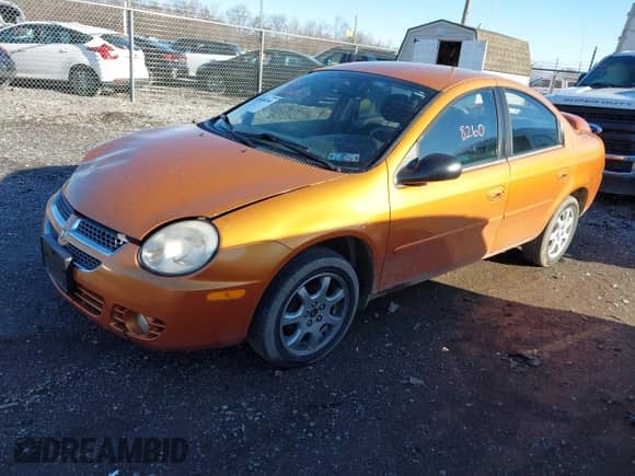 2005 Dodge Neon SXT with VIN 1B3ES56C75D264803, listed as a IAAI auction lot 41688260 with 104,336 mi miles and . Bid and sale history available at DreamBid. Image 2.