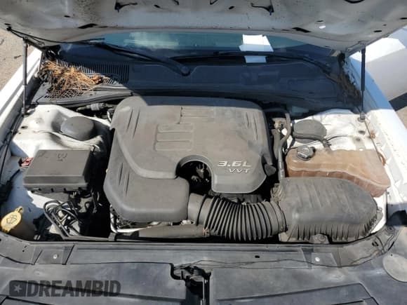 ✅ 2014 Dodge Challenger SXT • VIN: 2C3CDYAG6EH233786 • Lot: 74821874. Wystawiony na Copart z przebiegiem Nie podano. Bezpłatny archiwum sprzedaży aukcyjnych z USA i szczegółowy raport historii pojazdu na DreamBid. Zdjęcie 13.