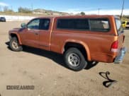 ✅ 2000 Dodge Dakota Sport • VIN: 1B7GG22NXYS641543 • Lot: 79862634. Wystawiony na Copart z przebiegiem 224 750 mil. Bezpłatny archiwum sprzedaży aukcyjnych z USA i szczegółowy raport historii pojazdu na DreamBid. Zdjęcie 2.