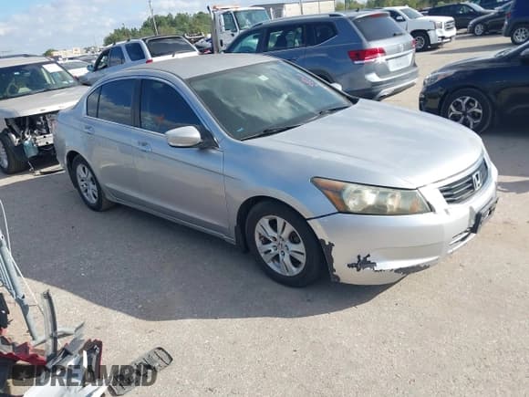 ✅ 2010 Honda Accord LX-P • VIN: 1HGCP2F45AA044748 • Lot: 43651842. Listed on IAAI with 166,734 mi. Free auction sales archive from the USA and detailed vehicle history report at DreamBid. Image 1.