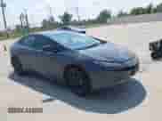 2024 Toyota Prius LE with VIN JTDACAAUXR3032131, listed as a IAAI auction lot 43231631 with 15,535 mi miles and . Bid and sale history available at DreamBid. Image 1.