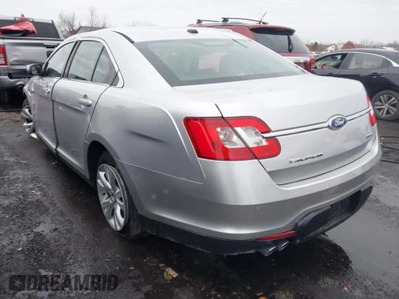 ✅ 2011 Ford Taurus SEL • VIN: 1FAHP2EWXBG115616 • Lot: 43673873. Listed on IAAI with 151,178 mi. Free auction sales archive from the USA and detailed vehicle history report at DreamBid. Image 3.
