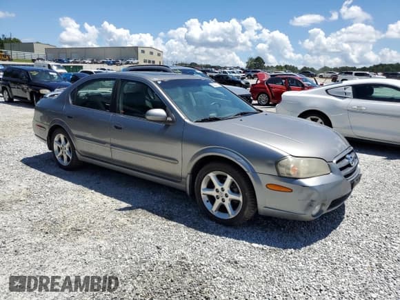 ✅ 2003 Nissan Maxima GLE • VIN: JN1DA31A13T403725 • Лот: 66225195. Опубликован ранее на Copart с пробегом 154 894 миль. Бесплатный доступ к архиву аукционных продаж из США и подробный отчёт об истории автомобиля на DreamBid. Изображение 4.