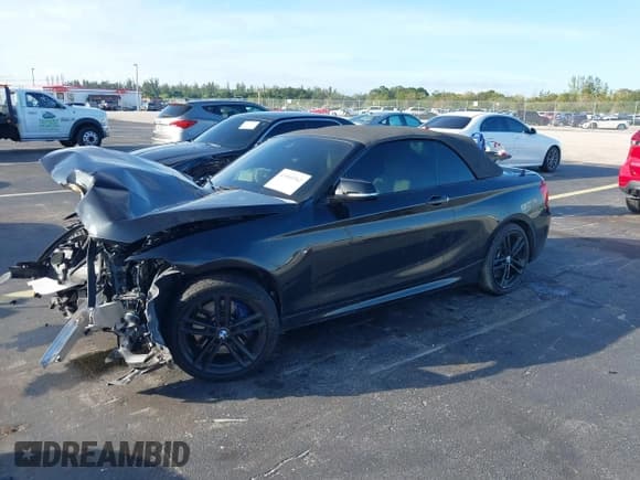✅ 2019 BMW 2 Series M240i • VIN: WBA2N1C54KVC28631 • Lot: 43560362. Listed on IAAI with 49,238 mi. Free auction sales archive from the USA and detailed vehicle history report at DreamBid. Image 2.