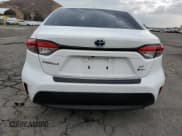 ✅ 2025 Toyota Corolla Hybrid LE • VIN: JTDBCMFE7S3070798 • Лот: 81526655. Опубликован ранее на Copart с пробегом 22 945 миль. Бесплатный доступ к архиву аукционных продаж из США и подробный отчёт об истории автомобиля на DreamBid. Изображение 6.