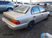 ✅ 1995 Toyota Corolla DX • VIN: 1NXAE09B3SZ344102 • Lot: 43751864. Listed on IAAI with 192,695 mi. Free auction sales archive from the USA and detailed vehicle history report at DreamBid. Image 4.