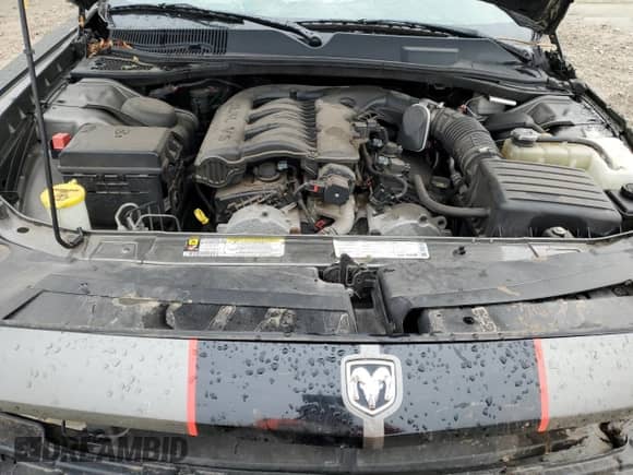 2010 Dodge Challenger SE с VIN 2B3CJ4DV7AH145882, выставлен на аукционе Copart как лот 82448895 с пробегом Не указан миль и На запчасти • Non repairable. История ставок и продаж доступна на DreamBid. Изображение 11.