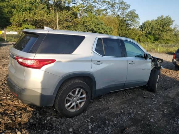 2018 Chevrolet Traverse LS with VIN 1GNEVFKW6JJ199862, listed as a Copart auction lot 69984765 with 74,949 mi miles and Salvage title. Bid and sale history available at DreamBid. Image 3.