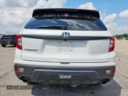 ✅ 2021 Honda Passport EX-L • VIN: 5FNYF7H57MB002751 • Lot: 69928005. Listed on Copart with 47,448 mi. Free auction sales archive from the USA and detailed vehicle history report at DreamBid. Image 6.