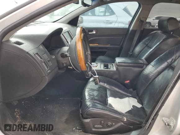 ✅ 2009 Cadillac STS RWD • VIN: 1G6DZ67A890170910 • Lot: 49590885. Wystawiony na Copart z przebiegiem 180 805 mil. Bezpłatny archiwum sprzedaży aukcyjnych z USA i szczegółowy raport historii pojazdu na DreamBid. Zdjęcie 7.