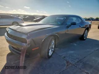 ✅ 2022 Dodge Challenger GT • VIN: 2C3CDZKG6NH215812 • Lot: 82091815. Wystawiony na Copart z przebiegiem 21 068 mil. Bezpłatny archiwum sprzedaży aukcyjnych z USA i szczegółowy raport historii pojazdu na DreamBid. Zdjęcie 1.