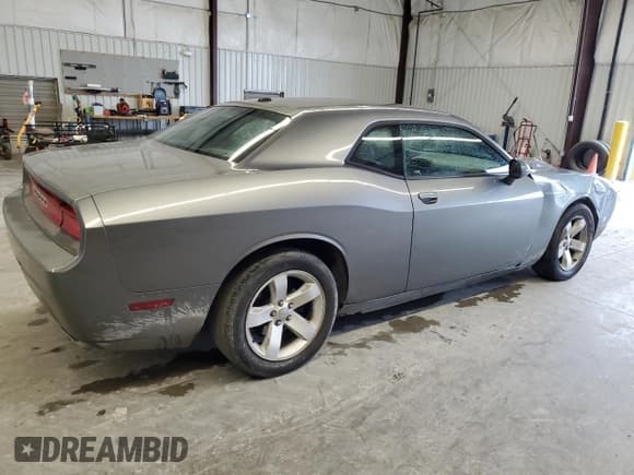 ✅ 2012 Dodge Challenger SXT • VIN: 2C3CDYAG1CH174885 • Lot: 44727385. Wystawiony na Copart z przebiegiem 219 845 mil. Bezpłatny archiwum sprzedaży aukcyjnych z USA i szczegółowy raport historii pojazdu na DreamBid. Zdjęcie 3.