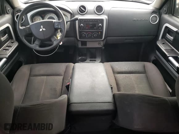 ✅ 2008 Mitsubishi Raider LS • VIN: 1Z7HC28K98S619809 • Lot: 74547364. Wystawiony na Copart z przebiegiem 122 835 mil. Bezpłatny archiwum sprzedaży aukcyjnych z USA i szczegółowy raport historii pojazdu na DreamBid. Zdjęcie 8.