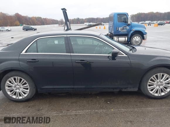 ✅ 2013 Chrysler 300 • VIN: 2C3CCARG8DH634026 • Lot: 43632026. Wystawiony na IAAI z przebiegiem 248 700 mil. Bezpłatny archiwum sprzedaży aukcyjnych z USA i szczegółowy raport historii pojazdu na DreamBid. Zdjęcie 13.
