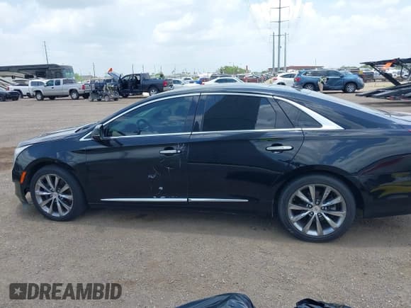 ✅ 2014 Cadillac XTS Livery • VIN: 2G61U5S30E9225953 • Лот: 42411043. Опубликован ранее на IAAI с пробегом 159 129 миль. Бесплатный доступ к архиву аукционных продаж из США и подробный отчёт об истории автомобиля на DreamBid. Изображение 13.