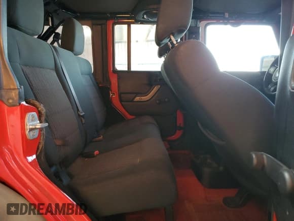 ✅ 2012 Jeep Wrangler Unlimited Sport • VIN: 1C4BJWDG3CL142930 • Lot: 82022565. Listed on Copart with 182,668 mi. Free auction sales archive from the USA and detailed vehicle history report at DreamBid. Image 11.