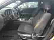 2009 Dodge Challenger SE z VIN 2B3LJ44V09H604858, wystawiony jako Copart lot #74292034 z przebiegiem Nie podano mil oraz Szkoda całkowita • Salvage title. Historia ofert i sprzedaży dostępna na DreamBid. Obrazek 7.