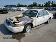 ✅ 1999 Mercury Grand Marquis LS • VIN: 2MEFM75W1XX736301 • Лот: 69645975. Опубликован ранее на Copart с пробегом Не указан. Бесплатный доступ к архиву аукционных продаж из США и подробный отчёт об истории автомобиля на DreamBid. Изображение 1.