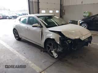 2019 Hyundai Veloster Premium z VIN KMHTG6AF7KU019571, wystawiony jako IAAI lot #41478431 z przebiegiem 107 197 mil mil oraz . Historia ofert i sprzedaży dostępna na DreamBid. Obrazek 1.