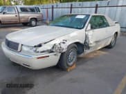✅ 1997 Cadillac Eldorado • VIN: 1G6EL12Y9VU611878 • Lot: 43130623. Wystawiony na IAAI z przebiegiem 73 335 mil. Bezpłatny archiwum sprzedaży aukcyjnych z USA i szczegółowy raport historii pojazdu na DreamBid. Zdjęcie 2.
