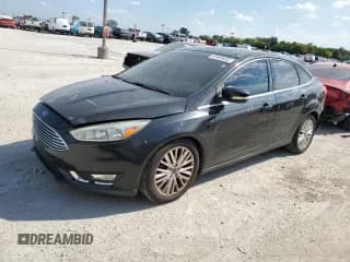 ✅ 2015 Ford Focus Titanium • VIN: 1FADP3J20FL260717 • Лот: 81869835. Опубликован ранее на Copart с пробегом 134 725 миль. Бесплатный доступ к архиву аукционных продаж из США и подробный отчёт об истории автомобиля на DreamBid. Изображение 1.