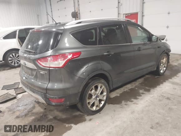 ✅ 2015 Ford Escape Titanium • VIN: 1FMCU9JX5FUA35888 • Lot: 41209408. Listed on IAAI with 125,378 mi. Free auction sales archive from the USA and detailed vehicle history report at DreamBid. Image 4.