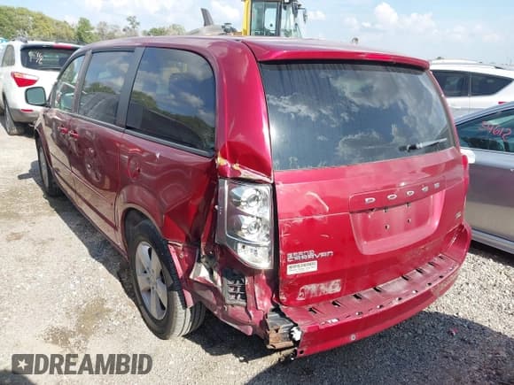 ✅ 2014 Dodge Grand Caravan SE 30th Anniversary • VIN: 2C4RDGBG1ER341791 • Lot: 43285408. Listed on IAAI with 100,854 mi. Free auction sales archive from the USA and detailed vehicle history report at DreamBid. Image 3.