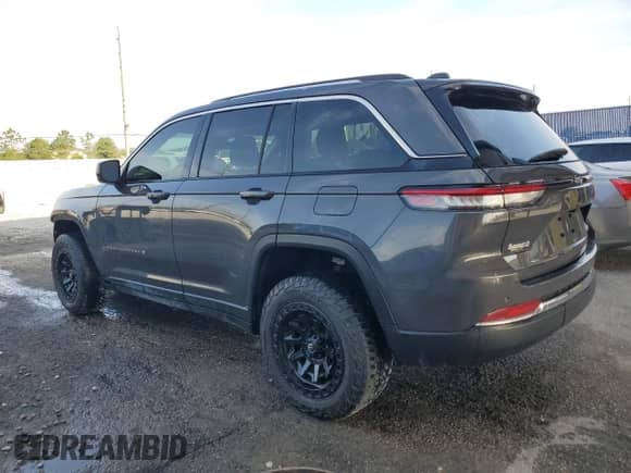 2022 Jeep Grand Cherokee Altitude with VIN 1C4RJGAG6N8589234, listed as a Copart auction lot 52606285 with 50,972 mi miles and Non repairable. Bid and sale history available at DreamBid. Image 2.