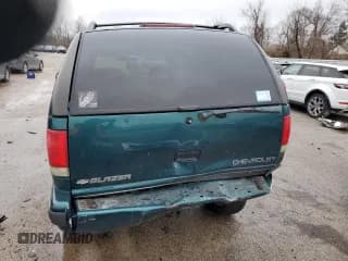 ✅ 1997 Chevrolet Blazer LS • VIN: 1GNDT13W1V2254432 • Lot: 74691234. Wystawiony na Copart z przebiegiem 136 331 mil. Bezpłatny archiwum sprzedaży aukcyjnych z USA i szczegółowy raport historii pojazdu na DreamBid. Zdjęcie 6.