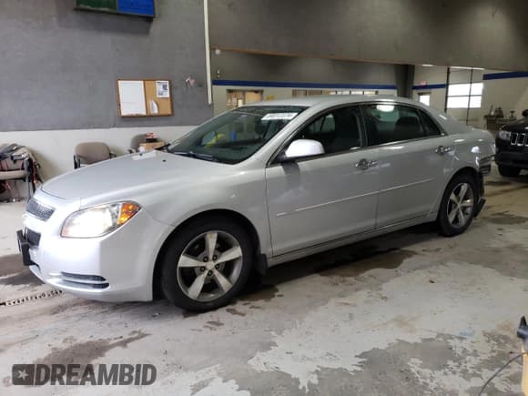 ✅ 2012 Chevrolet Malibu 1LT • VIN: 1G1ZC5E02CF235708 • Lot: 84012374. Listed on Copart with 137,415 mi. Free auction sales archive from the USA and detailed vehicle history report at DreamBid. Image 1.