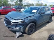 ✅ 2022 Mazda CX-30 S Carbon Edition • VIN: 3MVDMBCL9NM429826 • Lot: 42680808. Listed on IAAI with 28,234 mi. Free auction sales archive from the USA and detailed vehicle history report at DreamBid. Image 2.