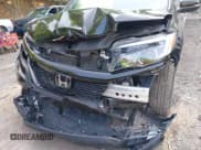 ✅ 2021 Honda Passport EX-L • VIN: 5FNYF8H57MB022083 • Lot: 42399294. Listed on IAAI with 61,014 mi. Free auction sales archive from the USA and detailed vehicle history report at DreamBid. Image 6.