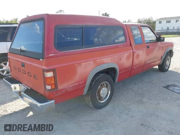 1991 Dodge Dakota z VIN 1B7FL23X5MS335433, wystawiony jako IAAI lot #41149799 z przebiegiem Nie podano mil oraz . Historia ofert i sprzedaży dostępna na DreamBid. Obrazek 4.