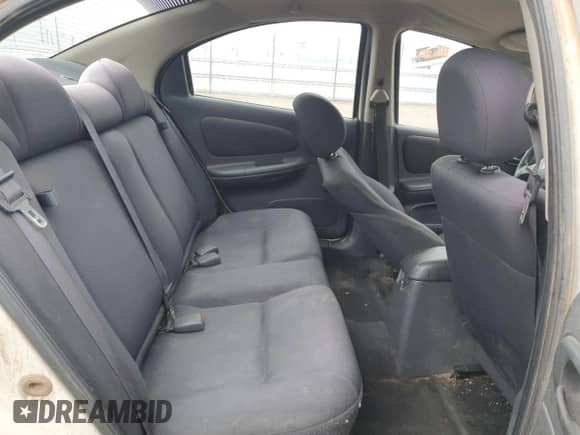 2003 Dodge Neon SE z VIN 1B3ES26C23D175247, wystawiony jako Copart lot #53463205 z przebiegiem 243 929 mil mil oraz Szkoda całkowita • Salvage title. Historia ofert i sprzedaży dostępna na DreamBid. Obrazek 10.