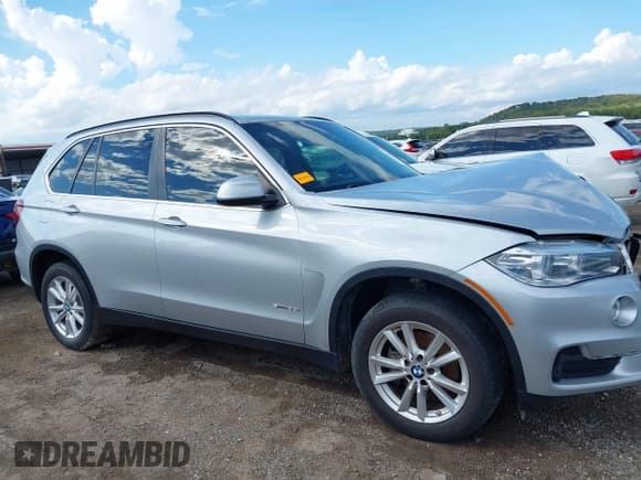 ✅ 2015 BMW X5 sDrive35i • VIN: 5UXKR2C5XF0H38920 • Lot: 43251474. Listed on IAAI with 130,812 mi. Free auction sales archive from the USA and detailed vehicle history report at DreamBid. Image 13.