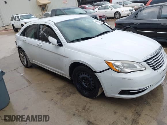 ✅ 2012 Chrysler 200 Touring • VIN: 1C3CCBBB1CN240698 • Lot: 43658210. Listed on IAAI with 173,092 mi. Free auction sales archive from the USA and detailed vehicle history report at DreamBid. Image 1.