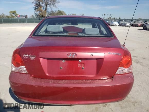 2005 Hyundai Elantra GLS z VIN KMHDN46D35U934587, wystawiony jako Copart lot #76984764 z przebiegiem Nie podano mil oraz Szkoda całkowita • Salvage title. Historia ofert i sprzedaży dostępna na DreamBid. Obrazek 6.